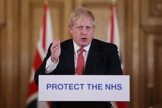 Boris Johnson's government gave new advice to businesses last night. Photo by Ian Vogler-WPA Pool/Getty Images