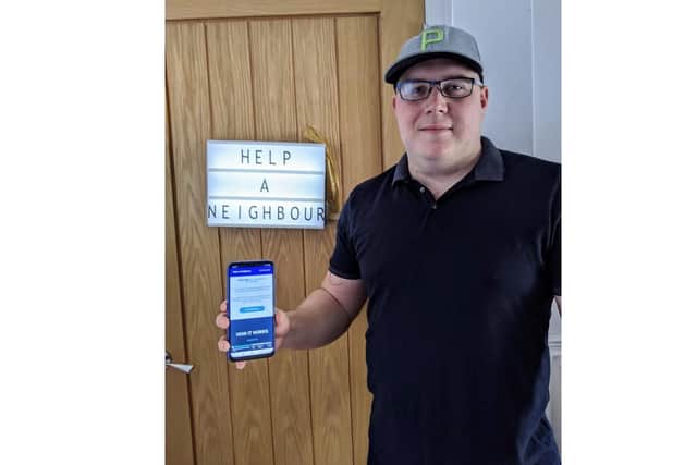 Andrew Bush with his app.
