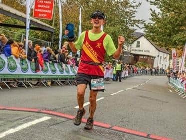 Michael Williams crosses the line in last year's Snowdonia Marathon