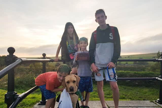 Ty with brothers Jacob, Jude and Ethan and dog Denby