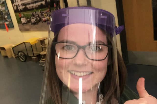 Katie Campbell with one of the visors.