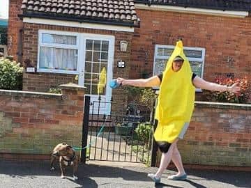 Banana woman - Sonia Mathieson with dog Brandy