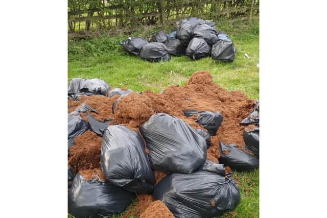 Three piles of rubbish were dumped in Kirby Lane. Picture: Northants Police Dog Section.