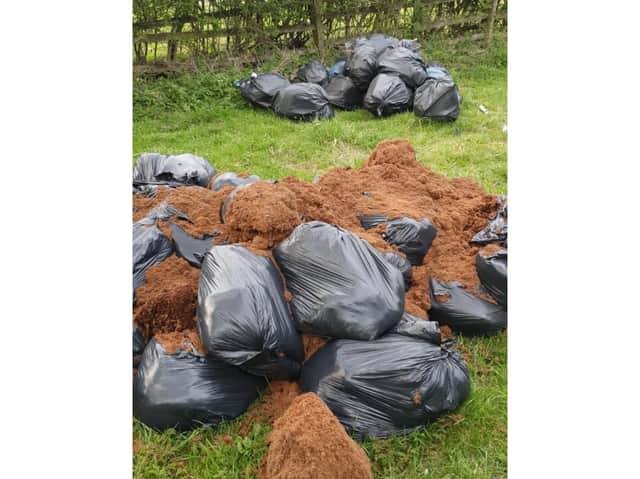 Three piles of rubbish were dumped in Kirby Lane. Picture: Northants Police Dog Section.