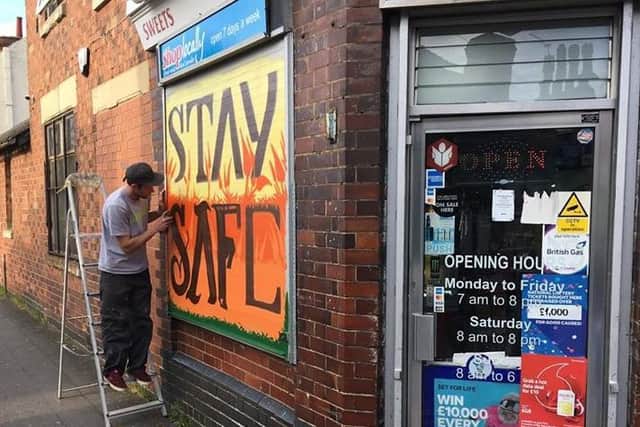Squidge sprays the Stay Safe message