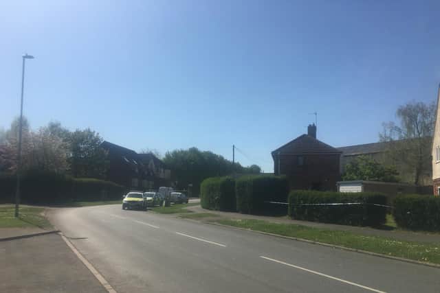 Police cars on the scene at the house in Stephenson Way