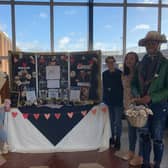 Team Hanabi from Kingsthorpe College with their trade stall at Swansgate Shopping Centre in Wellingborough in February. Photo: Young Enterprise
