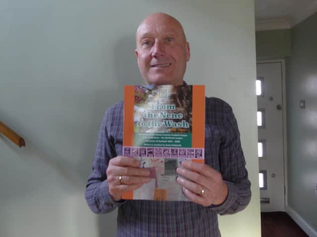 Andy Goldsmith with a copy of his book celebrating the 125th anniversary of the United Counties League