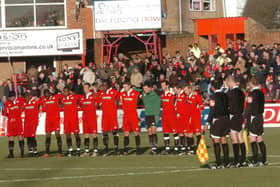 The Kettering Town players pictured ahead of kick-off against Fulham