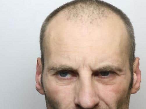 Moore is wanted on recall to prison