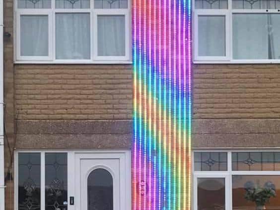 The LED light panel reaches the top of the roof