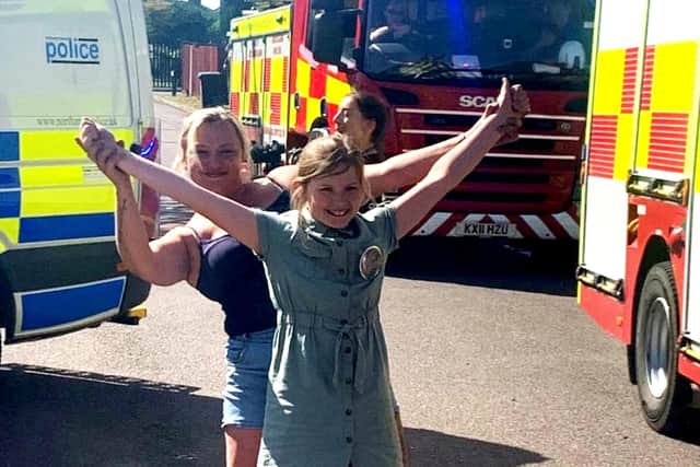 Chloe-Louise Horne celebrating her 11th birthday with a surprise visit from the emergency services