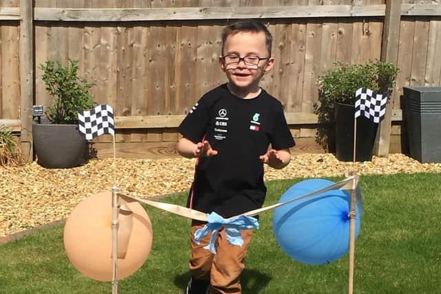 Oscar crosses the finishing line.