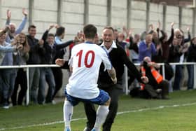 Alfie Taylor was met by then AFC Rushden & Diamonds manager Mark Starmer as they celebrated the striker's stoppage-time winner in the memorable 3-2 success over Cambridge City in the FA Cup in 2013