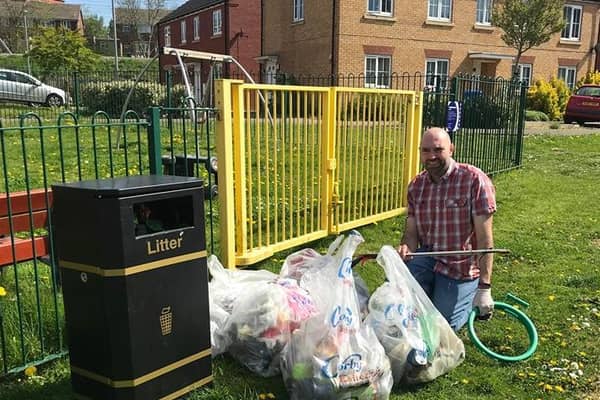 Lee Watkiss with some of the rubbish he has collected.