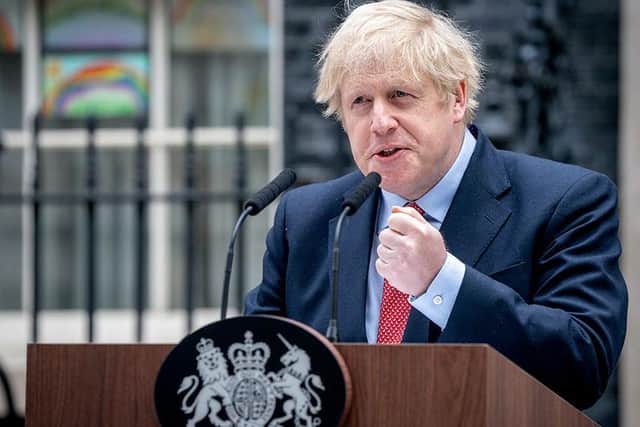 PM Boris Johnson outside 10 Downing Street this morning