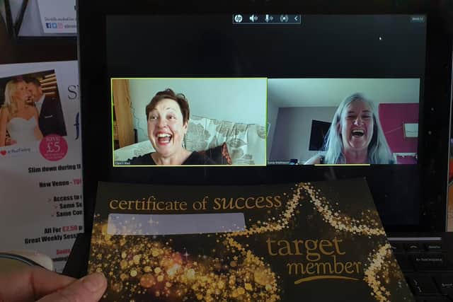 Clare receives her award via Zoom