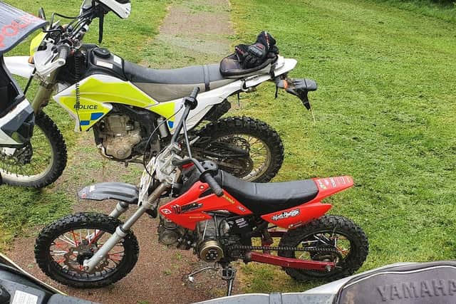 This red bike has been taken away by police officers who were riding their own off-roaders to help them catch the illegal riders