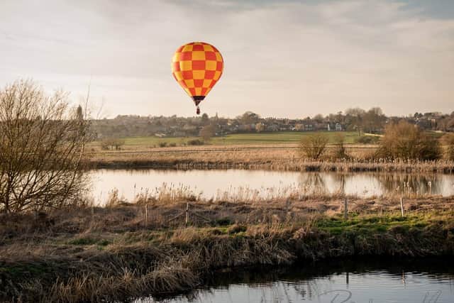 Hot air balloon over wetlands in the Nene Valley credit: Rose May photography