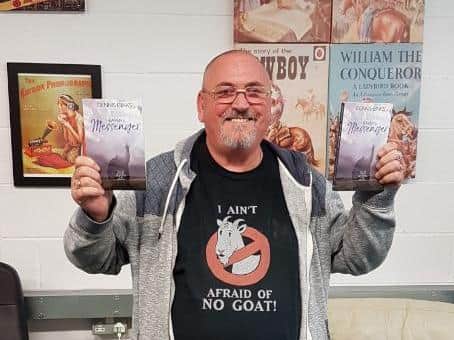 Dennis Binks of Corby with his book