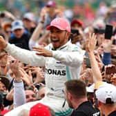 Lewis Hamilton celebrates victory at Silverstone in 2019 but the world champ will be racing with no fans this year. Photo: Getty Images