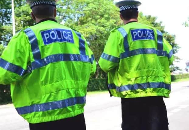A police officer was racially abused.