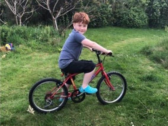 Arthur Hishin has pledged to ride his bike for a mile a day to raise money for the NHS.