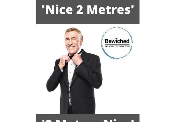 Brucie stickers have been placed on the floor to ensure customers stay 2m away from each other