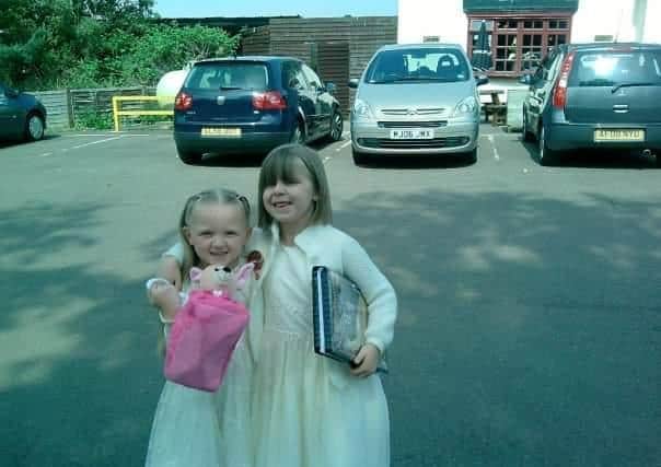 Sasha and older sister, by a year, Louise on one of their joint birthdays
