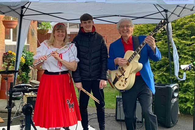Judy Caine, Karl Balmer and Paul Balmer ready for their weekly concert