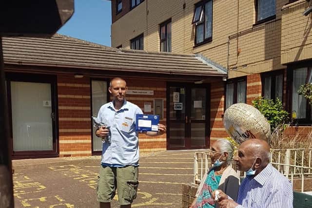 He was delivered a card from the Queen