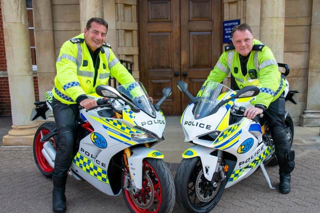 Nick Adderley and Kev Mulligan aboard the two new Ducatis. Photo Northamptonshire Police