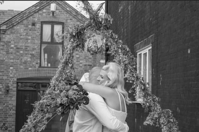 Emily and Lewis were 'married' on William Street, Kettering, last weekend. (Photo by Will Hackett)