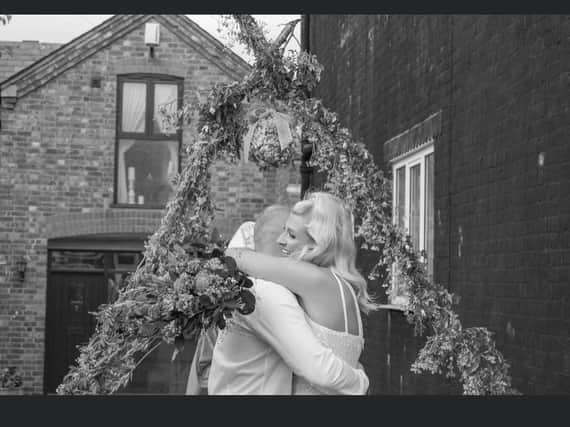 Emily and Lewis were 'married' on William Street, Kettering, last weekend. (Photo by Will Hackett)