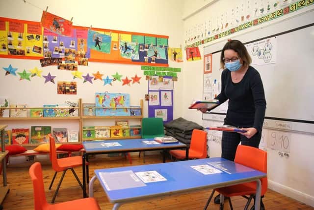 Classrooms are rearranged to keep kids two metres apart. Photos: Getty Images