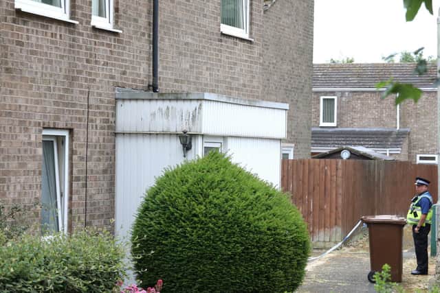 Police at the scene in Pages Walk, Corby