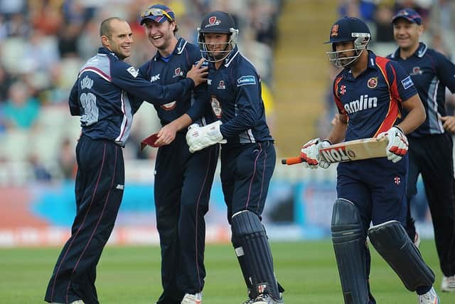 Alex Wakely congratulates Kyle Coetzer after the Scotsman snared the wicket of danger man Ravi Bopara