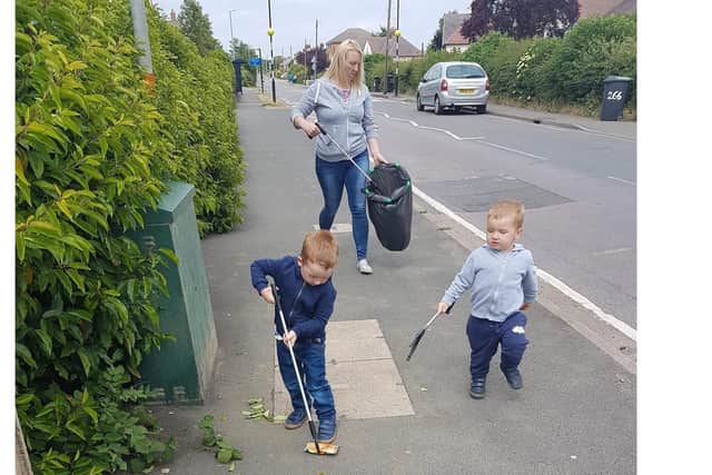 Kayleigh with Jenson, four, and two-year-old Finley