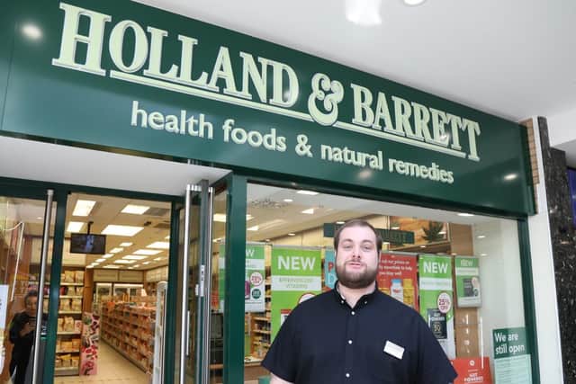 Holland & Barrett manager Josh Higgins.