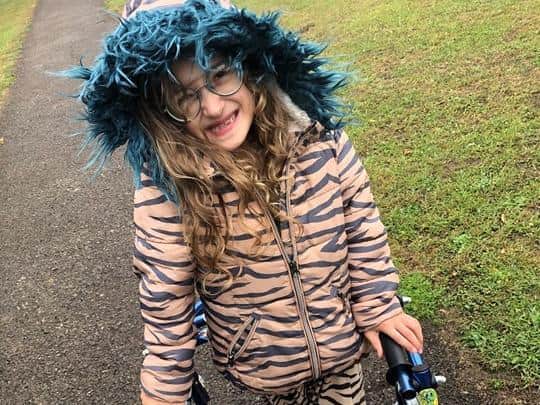 Evie in her tiger-print coat
