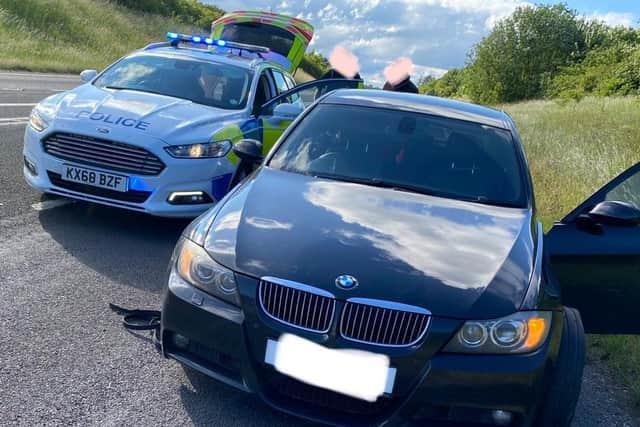 Police from the Road Crime Team halted the getaway BMW following an attempted robbery in Kettering. Photos: Northamptonshire Police