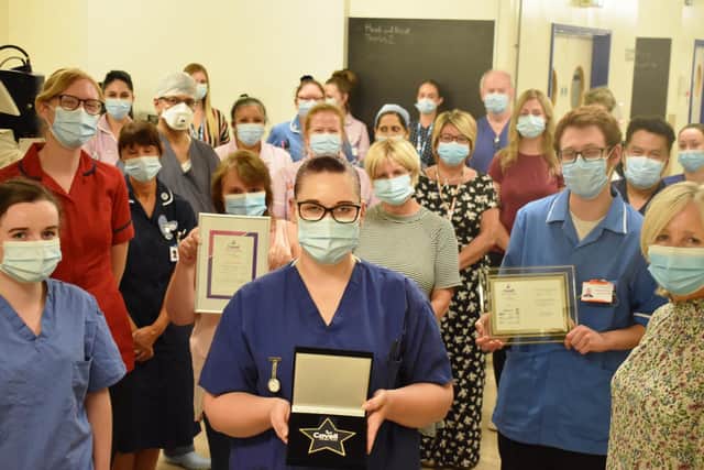 The Ophthalmology team with their award the award is held by Staff Nurse Louise Bulley, who has been working in the Intensive Care Unit.