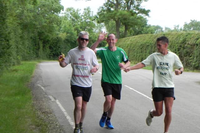 Ben (left) ran with Craig Lewis (middle) and his brother (right). Photo by Doug Currington