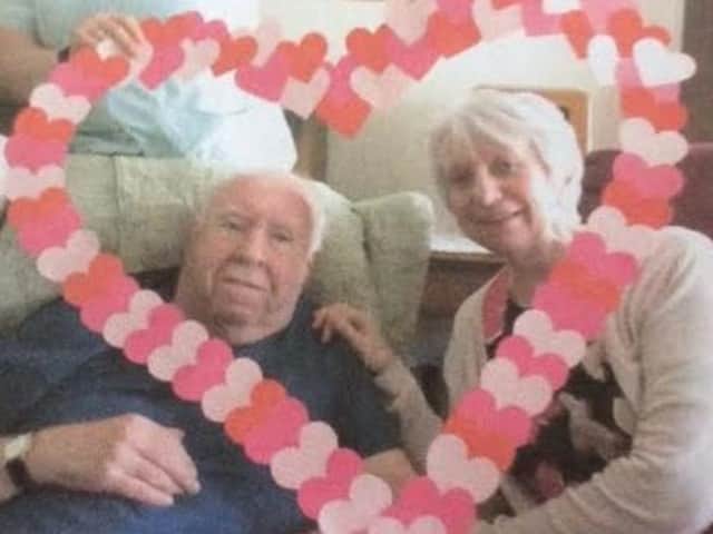 Lynda Goodman, pictured here with her husband Alex, had already complained to the hospital about discharging residents into the home. Alex now has the virus.