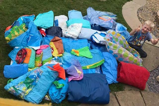 Dominic collected 80kg of inflatables after organising an amnesty in his village