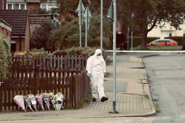 A forensic officer in Constable Road, close to the scene of a fatal stabbing in Corby in May. Picture: Alison Bagley