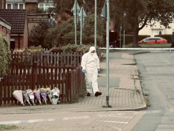 A forensic officer in Constable Road, close to the scene of a fatal stabbing in Corby in May. Picture: Alison Bagley