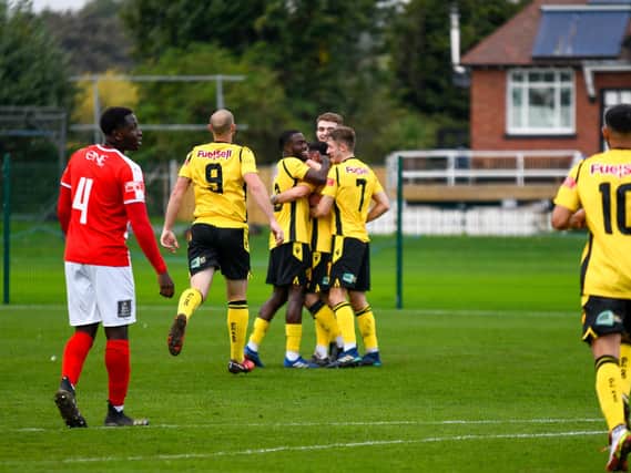 Connor Furlong takes the congratulations after he scored in AFC Rushden & Diamonds' 1-1 draw at Stourbridge last weekend. Picture courtesy of Hawkins Images