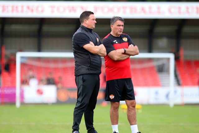 John Ramshaw (right) and boss Paul Cox are hoping to guide Kettering Town into the first round proper of the FA Cup for the first time in 10 years this weekend. Picture by Peter Short