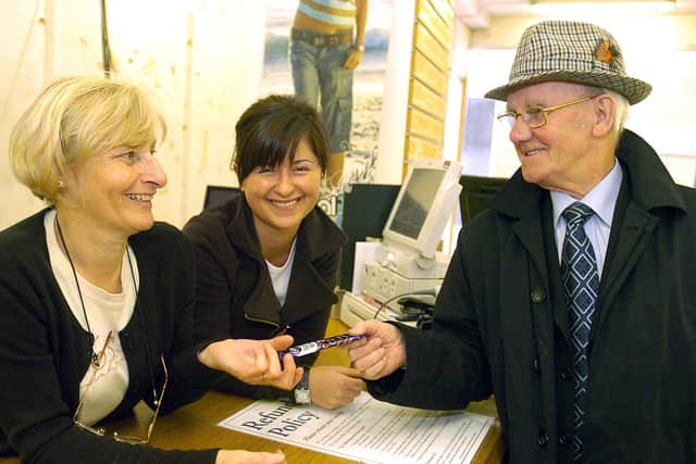 The final day of Westgate in 2007. Sue Merrell and Sylwia Gliwinska with long serving customer Bill Brown, who came into the shop daily with a chocolate bar for the workers.